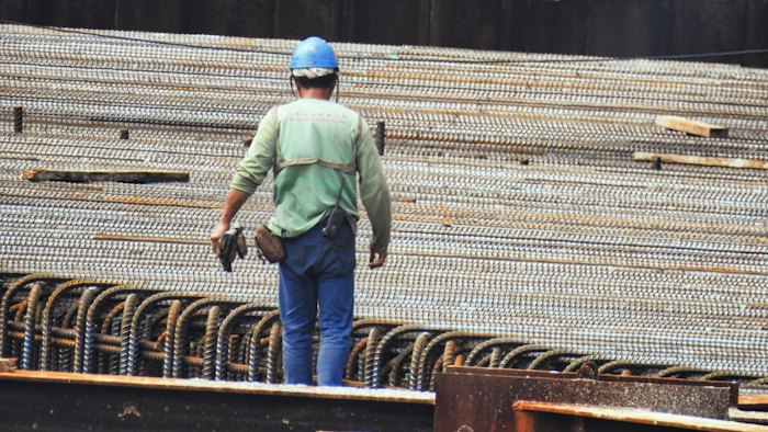 Construction worker in a hard hat on a job site